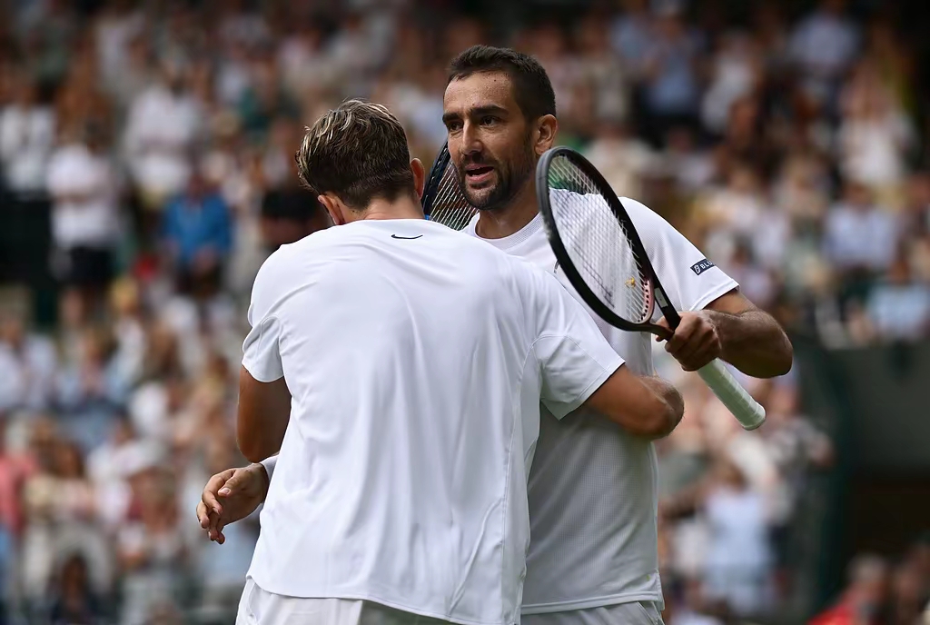 南宫娱乐- 德约科维奇回塞尔维亚庆祝夺金 